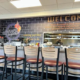 Dining counter window into kitchen.