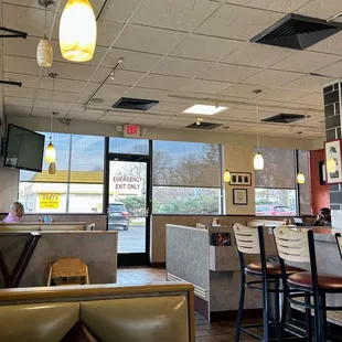 Booths and counter, top dining available.