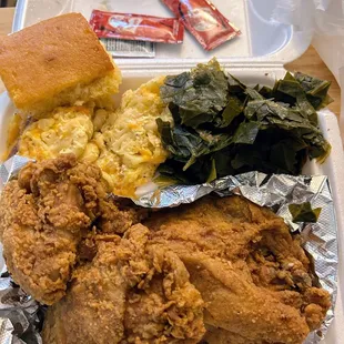 Three piece fried chicken, dinner with two sides and cornbread.