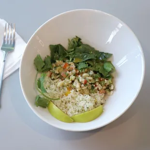 a bowl of rice and vegetables