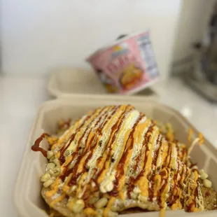 Tostikoreano , buldak noodles , corn , cheese , mayo , butter , chamoy