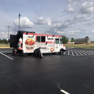 a food truck parked in a parking lot
