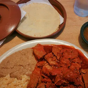 Guiso De Puerco, pork cubes in a red sauce, very consistent in flavor and how I used to have it back in Mexico as a child