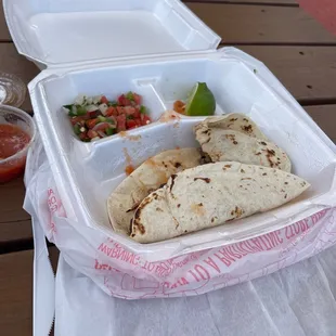 a burrito and salsa