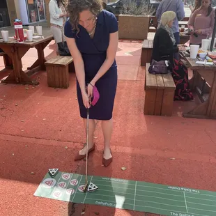 Putting practice with IPuttBetter.com on the Patio.