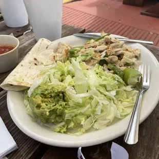 Chicken salad with lettuce and avocado.