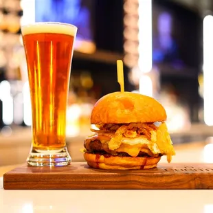 a burger and a glass of beer