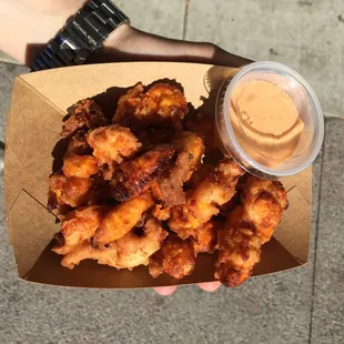 With sriracha aioli. Pretty greasy, but the batter and the cheese were delicious!!!