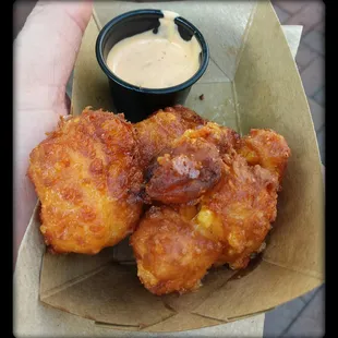 The fried curds with siracha aioli at the 2014 Taste of Madison were a disappointment.  Great batter, but sour flavor.