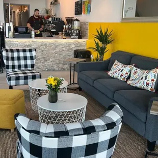 a black and white checkered couch and chairs