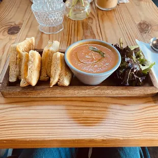 Grilled cheese and tomato soup platter. Not bland at all.