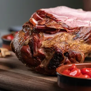 a ham on a cutting board