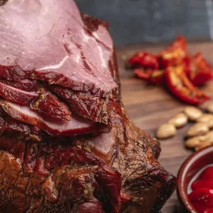 a ham on a cutting board