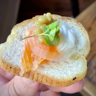 Complimentary "VIP" amuse bouche of house-smoked Ora king salmon. A gift for being their most regular customer