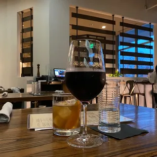 a glass of wine and a drink