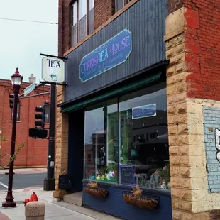 Curiosi-Tea House storefront on the corner of Riverfront &amp; Elm