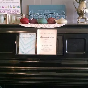 What tea shop doesn't need a piano and classic sheet music? Now if only I could play...