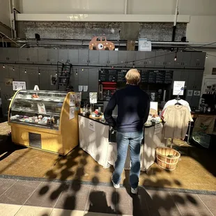 a man standing at the counter