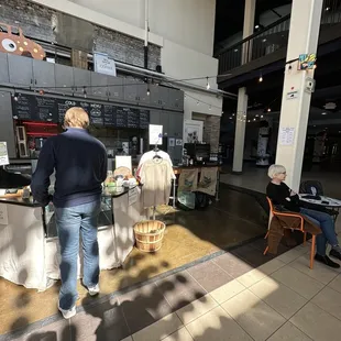 a man standing at a counter