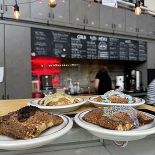 three plates of pastries