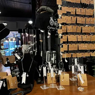 Silver earrings and necklaces display