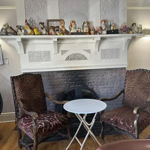 Indoor seating and fireplace.