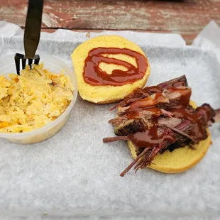 Brisket Sandwich and Cheesey Potatoes.