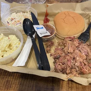 BBQ pork, pot salad and Cole slaw.