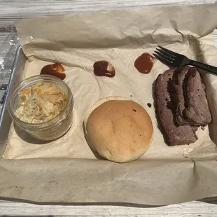 Brisket, bun and cheesy potato.