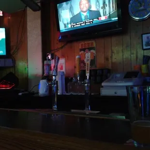 beers on tap and tvs
