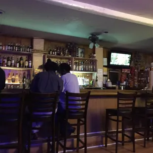 people sitting at the bar