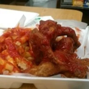 Wings, French fries with ketchup