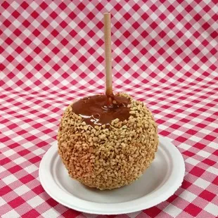 This honeycrisp caramel apple is sitting on a 6 inch plate. Gigantic and delicious!