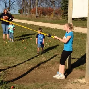 Hit the target with the apple launcher and win a baker's dozen of fresh made donuts.