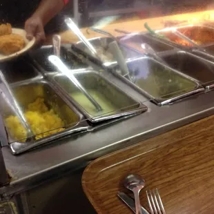 food being served at a buffet