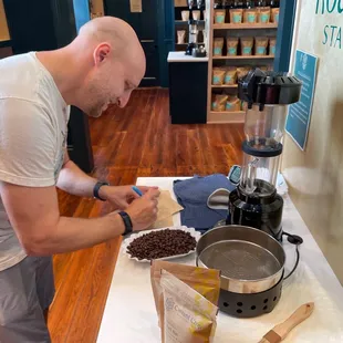 Customer roasting his own beans.
