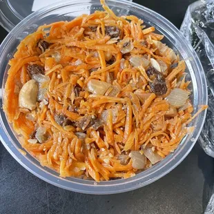 a bowl of shredded carrots