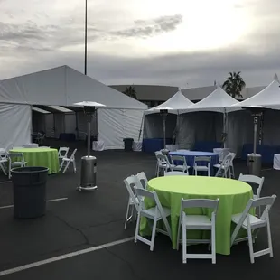 40 wide structure tent with 10x10 festivals 5' rounds W/lime and royal blue linens