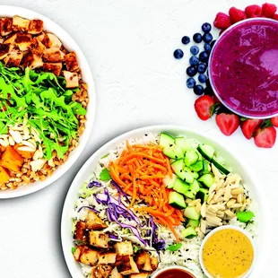 two bowls of salads and dressings