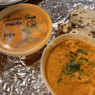 Left Chicken Tikka, right Butter Chicken, with Garlic Naan