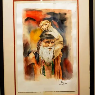 a watercolor painting of a man with a beard