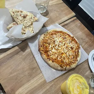 Garlic Naan and Chicken Tikka Masala Pizza and Mango Lassi