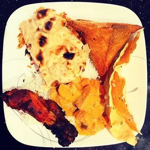 Chicken Tikka Masala Signature. Veggie Veg Samosa. Tandoori Chicken. Naan