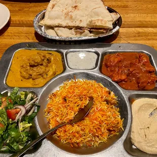 Arabic Thali: Chicken Makhani, Raita, Chicken Tikka Masala, Salad, Biryani Rice, Hummus, Naan