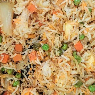 a mixture of vegetables and rice