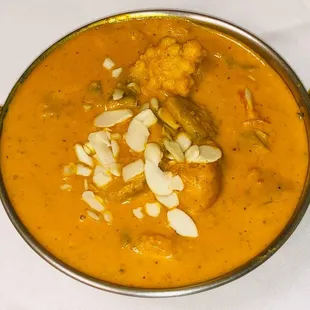 Korma Curry: Creamy cashew nut with indian spices and herbs.
