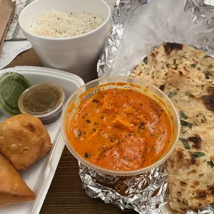 Chicken Tika 16 oz. Tofu Tikka Masala, Plain Rice, Somosa (really good dipping sauce) &amp; Garlic Naan all for 12.90 ( came with free rice)