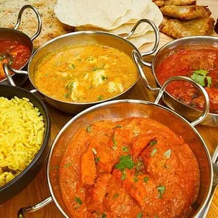 a variety of curry dishes