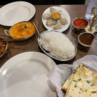 Goat Vidaloo, Chicken Tikka Masala, Chicken MoMo, Garlic Naan, Chutney.