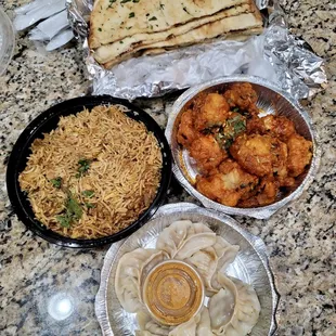 Gobi Manchurian, Chicken MoMo, Chicken Biryani, Garlic naan, Stuffed Naan